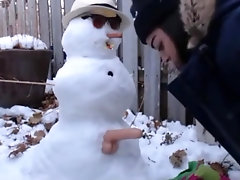 fuck snowman in the yard of house