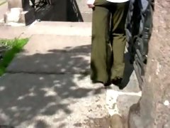 Amateur brunette lady pissed in her pants in public