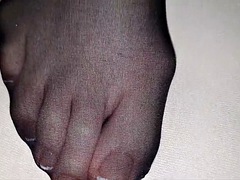 Black nylon stocking on wifes French toenails covered in detail by a big load of cum