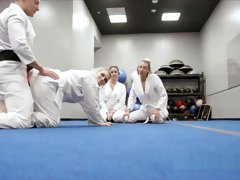 Foursome with horny teens during martial arts training