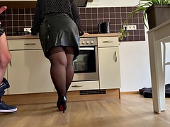Lusty mother-in-law fucked in the kitchen and made her son-in-law cum on her skirt