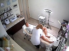 Woman doing depilation on her pussy