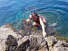 Nippleringlover Extremely pierced nipples and pussy horny MILF swims naked on a public beach